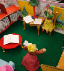 Here I am reading a scary story to the student artist in a diorama of her dream library.